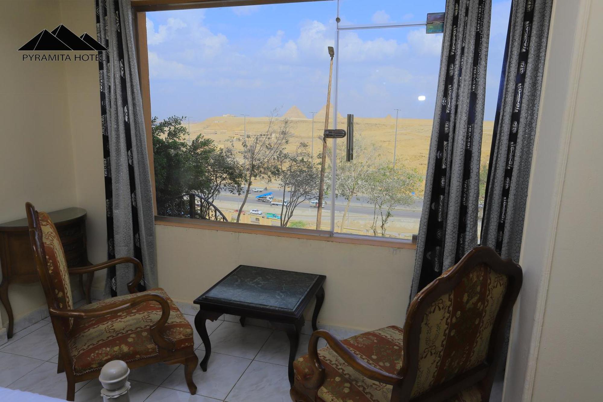 Pyramita Hotel Ghatati Ngoại thất bức ảnh